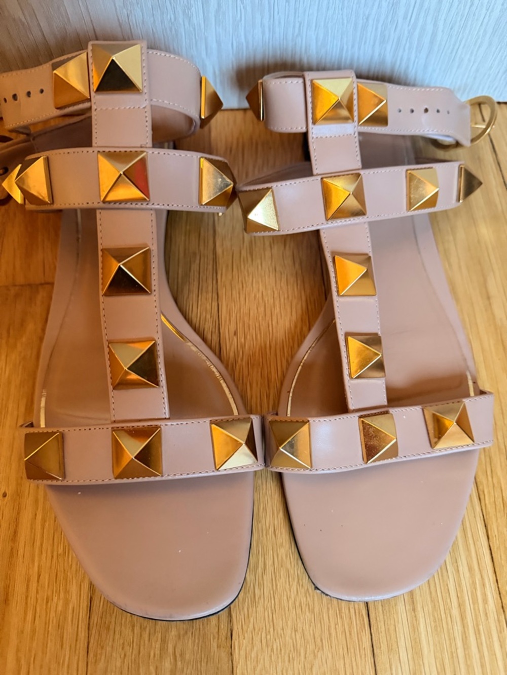 Valentino Garavani nude cream Leather Studded T-Strap Sandals with Gold Pyramids
